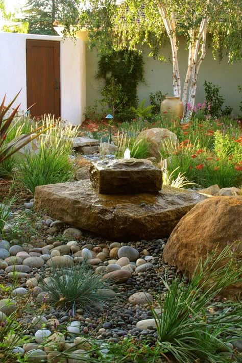 23 Inspiring outdoor garden fountains to add tranquility to your landscape Mediterranean Landscape Design, Rock Garden Design, Mediterranean Landscaping, Rock Garden Landscaping, Water Features In The Garden, The Secret Garden, Garden Fountain, Mediterranean Garden, Garden Fountains