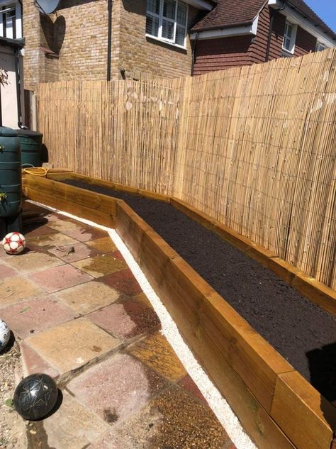 Sleeper Flower Beds, Long Raised Flower Beds, Raised Sleeper Flower Beds, Sleeper Planter Ideas, Garden Sleeper Ideas, Raised Flower Beds Sleepers, Raised Flower Beds Along Fence, Sleepers Garden Ideas, Sleeper Raised Beds With Seating