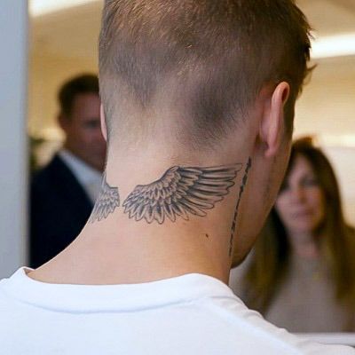 Neck Tattoo Wings, Justin Bieber Neck Tattoo, Justin Bieber Wings Tattoo, Mandala Tattoo Mann, Wing Neck Tattoo, Cross Tattoo Neck, Eagle Wing Tattoos, Justin Bieber Tattoos, Tattoo Wings