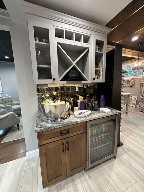 Whether you love cocktails or coffee, a dedicated serving area is a great addition to your new kitchen and entertaining space. Create a morning cappuccino bar to make guests feel welcomed, or liven up a dinner party with a self-serve drinks station. What makes this bar so awesome?  	 #KitchenCabinetry #HomeBar #CoffeeBar #DesignInspo #DreamKitchen #KitchenDesigners #HomeDesign #EmilysInteriors #ShrewsburyMA Drinks Station, Wet Bar Designs, Entertaining Space, Drink Station, Self Serve, Bar Areas, Kitchen Cabinetry, Wet Bar, Entertainment Space