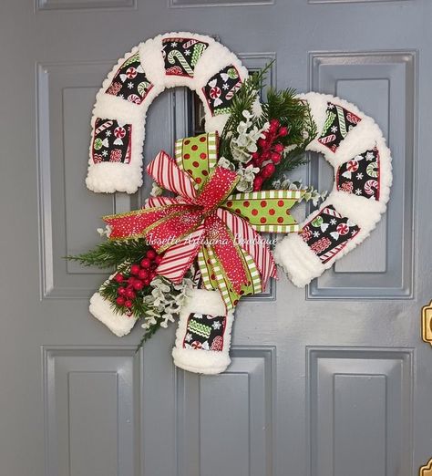 141K views · 3.7K reactions | Double candy Cane wreath | Candy Cane Door Hanger using Yarn. Supplies - Dollar tree Candy cane frame (2) -Yarn (1 roll ) - Zip ties -Glue gun ( Glue stick) -ribbon for bow... | By Josette Artisana Boutique | Facebook Dollar Tree Candy Cane, Candy Cane Wreath Diy, Candy Cane Door Hanger, Cane Door, Dollar Store Christmas Crafts, Holiday Wreaths Diy, Wreath Candy, Deco Mesh Christmas Wreaths, Christmas Mesh Wreaths