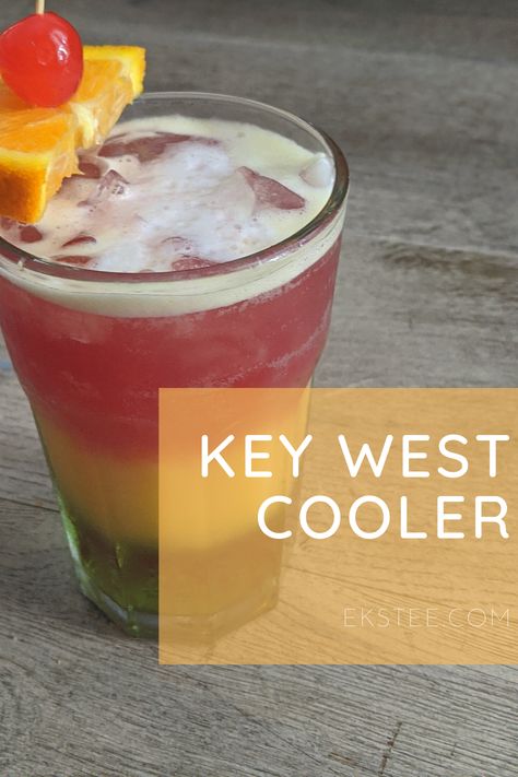 Show off your bartending skills by making this fruity Key West Cooler with the ingredients layered on top of each other! Click through to see the simple recipe and surprisingly easy layering instructions. #keywestcooler #cocktail #vodka Cooler Cocktails, Key Lime Colada Drink, Key West Drinks, Tiki Mocktail Recipe, Key West Bar Crawl, Opal Key Resort Key West, Mocktails, Key West, Cocktail Recipes