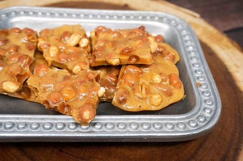 This Microwave Buttery Peanut Brittle recipe is our very popular Extra Buttery Peanut Brittle recipe that has been adapted for the microwave oven. We're making the same fabulous brittle, but only faster and easier. Buttery Peanut Brittle, Peanut Patties, Stovetop Appetizers, Microwave Peanut Brittle, Peanut Brittle Recipe, Microwave Fudge, Brittle Recipes, Candy Recipes Homemade, Peanut Brittle