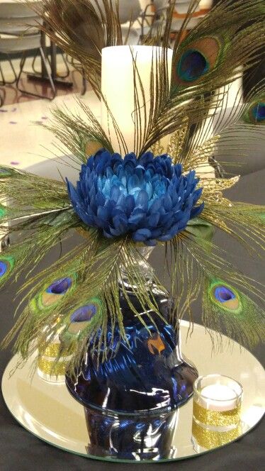 Centerpiece #daughterswedding Peacock Wedding Centerpieces, Peacock Wedding Decorations, Feather Centerpiece Wedding, Christmas Floral Arrangements Diy, Cheap Wedding Table Centerpieces, Feather Arrangements, Peacock Centerpieces, Silk Flower Centerpieces, Unique Wedding Centerpieces