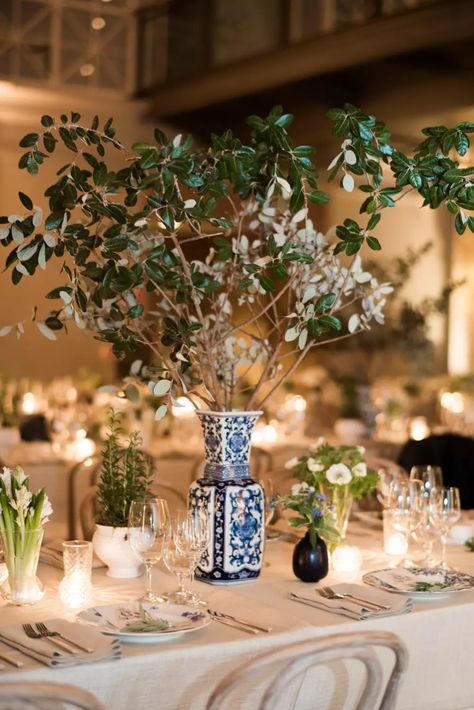 34 Affordable Centerpieces for Any Wedding Style Asian Centerpiece Ideas, Asian Inspired Wedding Decor, Picture Centerpieces Wedding, Cheap Table Centerpieces, Wedding Centerpieces Cheap, Tree Centerpieces Wedding, Tree Centrepiece Wedding, Affordable Centerpieces, Bamboo Centerpieces