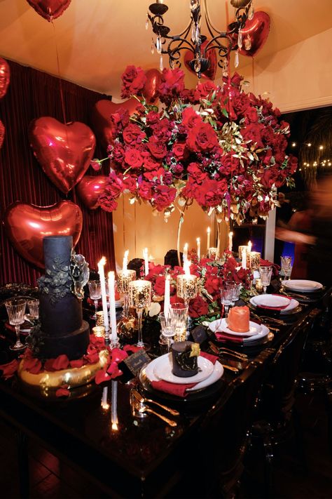 We're head over heels for this Valentine's Day dinner and moody tablescape Rich red roses, classic heart-shaped balloons, and glitzy black details made this a unique yet romantic setting. Find vendors for your own dinner parties in PartySlate's curated directory. Rose Dinner Party, Condo Aesthetic, Moody Tablescape, Bday Stuff, Event Business, Birthday Party Decorations Diy, Valentine Party, Tablescape Ideas, Easy Birthday