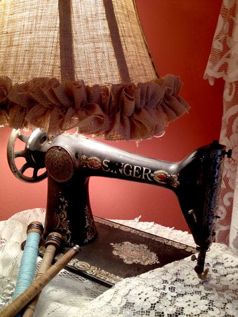 Antique Singer sewing machine turned into a lamp - featured at the Knick of Time Tuesday Vintage Party Old Singer Sewing Machine Repurposed, Refurbished Singer Sewing Machine, Singer Sewing Base Repurposed, Sewing Machine Lamp, Lamp Made From Old Sewing Machine, Sewing Drawers, Upcycled Sewing, Burlap Lampshade, Old Singer Sewing Machine