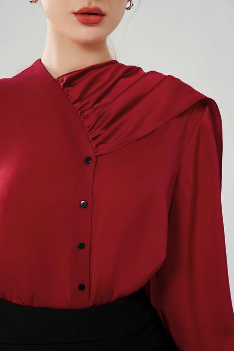 Soft and feminine, this red blouse is truly a must-have. Breathable silk fabric makes it comfortable to wear, while the draped neckline gives it a chic look. Its long puffy sleeves with button cuffs enhance its airy and elegant appeal. This definitely gives some energy into your looks. Types Of Blouses, Blue Samba, Silk Top Outfit, Clothing Design Details, Draped Tops, Vintage Style 70s, Long Puffy Sleeves, Interesting Outfits, Mean Blvd