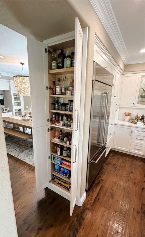 We made a spice cabinet from a hollow wall in our remodeled kitchen. Wall Spice Cabinet, Coastal Kitchen Remodel, Wall In Kitchen, Lake Kitchen, Hollow Wall, Open Kitchen And Living Room, Kitchen Cabinets And Countertops, House Organisation, Large Pantry