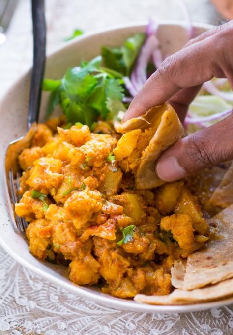 Aloo Gobi Recipe | chefdehome.com Ali Gobi Recipe, Hare Krishna Food Recipes, Aloo Gobi Recipe Authentic, Subji Indian Dishes, Hare Krishna Recipes, Alo Gobi Recipe, Alo Gobi, Aloo Gobi Recipe Punjabi, Pureed Vegetables