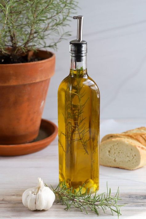 Infused olive oils are a great way to add extra flavor to your meals. Our garlic and rosemary infused olive oil requires just three ingredients and 10 minutes to make your own infused olive oil at home. Get this recipe for a quick and easy way to enhance the flavors of your meals. Rosemary Infused Olive Oil, Infused Oil Recipes, Herb Infused Olive Oil, Homemade Dressings, Garlic Infused Olive Oil, Humble Heart, Vinegar Bottle, Olive Oil Recipes, Lemon Olive Oil