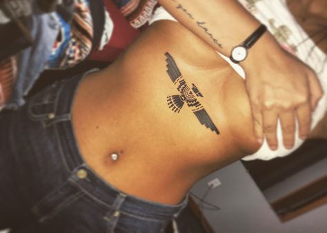 Western Stomach Tattoos Women, I Dont Need The Laws Of Man Tattoo, Thunderbird Back Tattoo, Western Lower Back Tattoo, Mayan Tattoo Ideas, Cowboy Style Tattoo, Thunderbird Tattoo Women, Western Back Tattoos For Women, Spine Tattoo Western