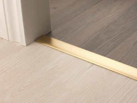 Satin Brass Door Bars & Door Thresholds are durable and have a high quality finish to suite a wide range of surfaces. Uk Door, Under Floor Heating, Floating Floors, Door Thresholds, Stair Rods, Elegant Doors, Gold Door, Georgian House, Floating Floor