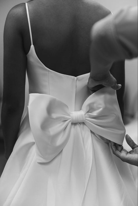 wedding dress bow wedding details dress inspo bridal look Black Bow Wedding Dress, Bow Behind Dress, Mini Wedding Dress With Bow, High Neck Wedding Dress With Bow, Bow Detail Wedding Dress, Short Wedding Dress Big Bow, Silk Wedding Dress Bustle, Short Bow Wedding Dress, Bow Bridal Dress