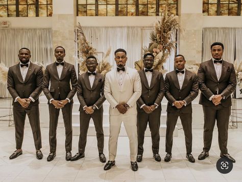 Brown Tux Wedding Party, Chocolate Brown Groomsmen Suits, 2023 Groomsmen Trends, Tan Suit Wedding Black Man, Brown Tux Groomsmen, Chocolate Brown Wedding Colors, White And Brown Groom Suit, Champagne And Brown Wedding Colors, Dark Tan Wedding Suits