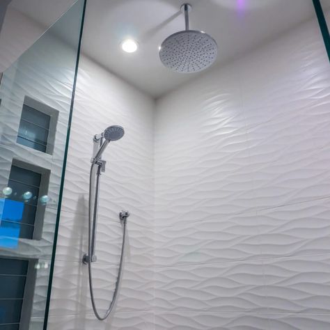 Bathroom shower wavy white tile • Rykon Construction Wavy Tile Bathroom Showers, White Wavy Tile, Shower Inlay, White Shower Tile, Marble Shower Tile, White Tile Shower, Florida Decor, Bathroom Upgrade, Lakeside Living