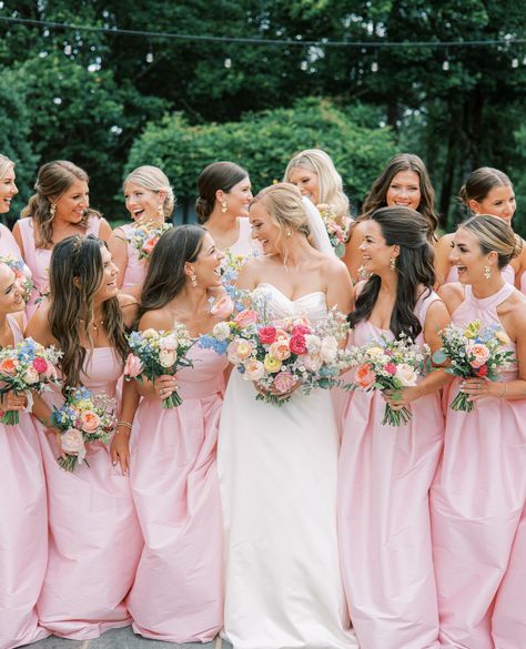 We’ll never get over perfectly pink bridal parties! If you’re looking to create a just-mismatched-enough look, take a tip from the way bride Eliza styled her girls. They all wore Peony Shantung and our the Dahlia floor-length skirt, but selected their own bodices to make their dresses their own. 🌸 Cheers to the beautiful bride and groom! We’re so thankful to have been part of your special day. #lulakate #bride #weddinginspo #bridesmaidsdresses Navy Groomsmen Suits, Pink Bridal Party, White Rose Petals, Angel And Stitch, Pink White Wedding, Light Pink Bridesmaid Dresses, Stitch Wedding, Bright Wedding Flowers, Wedding Color Pallet