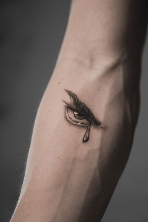 The Fallen Angel Eyes Tattoo, Eye Tattoo With Tear, Mens Eye Tattoo Ideas, Eyes Of Lies Tattoo, Fallen Angel Eyes Tattoo, Lover You Should've Come Over Tattoo, Crying Eye Tat, Elbow Eye Tattoo, You Vs You Tattoo