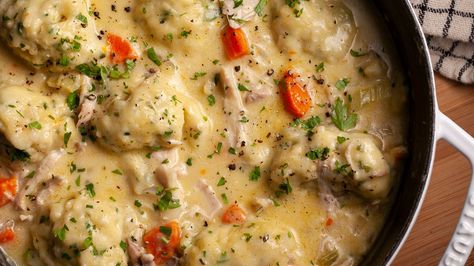 Light and fluffy dumplings find their forever home in a bold and savory gravy, made with reinforced chicken stock. Fluffy Dumplings, Pizza Sides, Munchies Recipes, Easy Dumplings, Sip And Feast, Feast Recipes, Chicken And Dumplings Recipe, Homemade Chicken And Dumplings, Meal Rotation