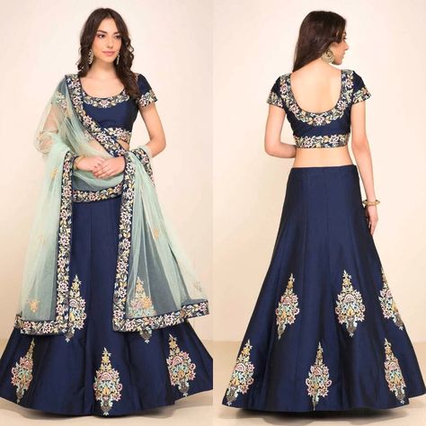 The navy blue lehenga set is adorned with colourful resham embroidery on the blouse and lehenga. It is paired with a mint green net dupatta edged with embroidered border.  CODE-ZC7010  #LEHENGA (Semi-Stitched) FABRIC : Tafeta WORK : colourful resham embroidered. INNER : Shantoon FLAIR : 3.50mtr size : waist-44" height-44"  #BLOUSE (Unstitched) FABRIC : Tafeta WORK : colourful resham embroidered. SIZE : up to 42"  #DUPATTA FABRIC : mint green Net Work : resham embroid.. Navy Blue Indian Outfits, Blue Indian Outfit, Blue Lehenga Choli, Navy Blue Lehenga, Red Lehenga Choli, Resham Embroidery, Indian Fashion Trends, Blue Lehenga, Lehenga Skirt