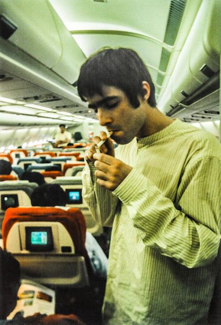 Liam Gallagher of Oasis Smoking a Cigarette on an Airplane, 1995Liam Gallagher of Oasis Smoking a Cigarette on an Airplane, 1995 On An Airplane, Noel Gallagher, Liam Gallagher, On Board, Oasis, Twitter