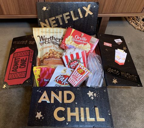 Netflix and Chill Care Package- Air Force deployment, movie night care package, admit one card, popcorn and favorite movie theater candies/snacks Movie Night Care Package Ideas, Movie Care Package Ideas, Movie Night Valentines Gift, Netflix And Chill Box Gift, Movie Night Care Package, Netflix And Chill Basket Ideas, Netflix And Chill Birthday Party, Netflix And Chill Gift Basket Ideas, Movie Box Gift Diy