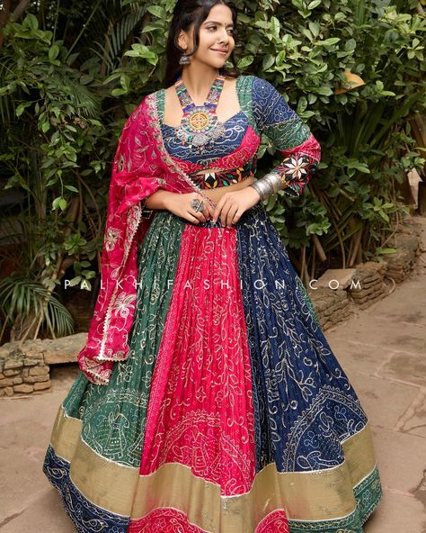 💃 Twirl into Garba nights in pure luxury with our Bandhani Gaji Silk Designer Chaniya Choli! ✨ This masterpiece features a breathtaking full-flair lehenga with intricate bandhani and vintage work, a multi-color embroidered blouse, and a contrasting soft silk dupatta. This Navratri, celebrate in style and embrace the rich heritage of Indian textiles. Shop now at Palkhi Fashion and make a statement! Learn More: palkhi.us/link #PalkhiFashion #Navratri #Garba #ChaniyaCholi #Bandhani #SilkLehen... Vintage Dupatta Chaniya Choli, Bandhani Chaniya Choli Designs, Leriya Chaniya Choli, Garba Look, Traditional Chaniya Choli, Flair Lehenga, Designer Chaniya Choli, Bandhani Lehenga, Palkhi Fashion