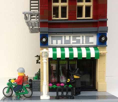 Lego Modular Music Store Storefront | Guitars on display in … | Flickr Lego Music Store, Lego Music, American Midwest, City Ideas, Lego Buildings, Lego Modular, Store Window, Lego Architecture, Double Glass