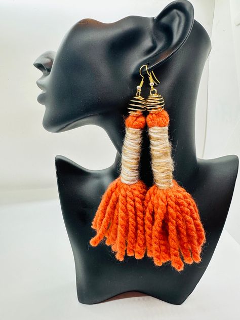 Handmade yarn earrings are unique, lightweight accessories crafted from various yarn materials. They come in a variety of colors and styles, including tassels, hoops, and geometric shapes. These earrings are comfortable, eco-friendly, and offer a personal touch as they are handcrafted. They're versatile for both casual and special occasions and can be customized. Handmade yarn earrings make for excellent, one-of-a-kind gifts.Made from 100% acrylic fiber yarn. Diy Yarn Earrings, Yarn Tassel Earrings, Fringe Earrings Diy, Afro Earrings, Yarn Jewelry, Yarn Earrings, Fiber Earrings, Hoop Earrings Diy, Yarn Tassel