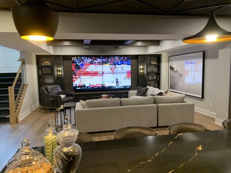 Classy Man Cave Basement, Basement Entertainment Area, No Window Basement Ideas, Entertainment Basement Ideas, Multiple Tv Wall Ideas Man Cave, Tv Den Room Ideas, Basement Entertainment Wall, Home Theater Ideas Living Room, Basement Tv Wall Ideas