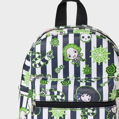 Bring the fun of horror-comedy Beetlejuice to your kid's bag collection with the Beetlejuice 10-Inch Backpack. This black miniature backpack is covered with Beetlejuice character prints on the striped backdrop for a creepy-cool look. It features a large interior compartment, two bottle holders and a front accessory pocket to give them ample space for their school supplies and other small items. Designed with a faux-leather construction, the backpack has a zipper closure to help keep the contents Beetlejuice Character, Beetlejuice Characters, Miniature Backpack, Character Prints, Bag Packs, Horror Comedy, Beetle Juice, Sequin Backpack, Beetlejuice Beetlejuice