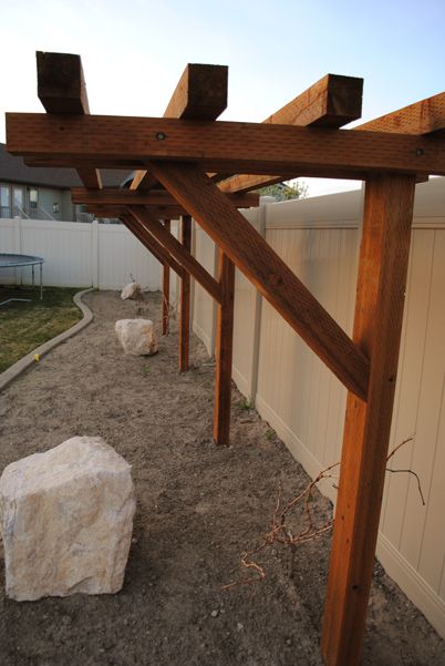 Diy Wood Arbor Trellis, Backyard Landscaping Along Fence, Fence Trellis, Landscaping Along Fence, Rustic Pergola, Vine Trellis, Wood Trellis, Cheap Pergola, Pergola Swing