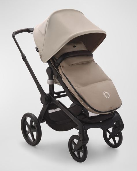 Stay warm in style with a musthave stroller accessory specially designed for the colder seasons    Bugaboo performance winter footmuff    Made with premium quality, ultra soft materials    Recommend for 6 months or up to 50 lbs    Approx. 27.6"L    Item Weight (Lbs.): 2.5    Polyester    Imported Bugaboo Stroller, Luxury Stroller, Stroller Accessories, Cold Season, Midnight Black, Little People, Stay Warm, 6 Months, Stroller