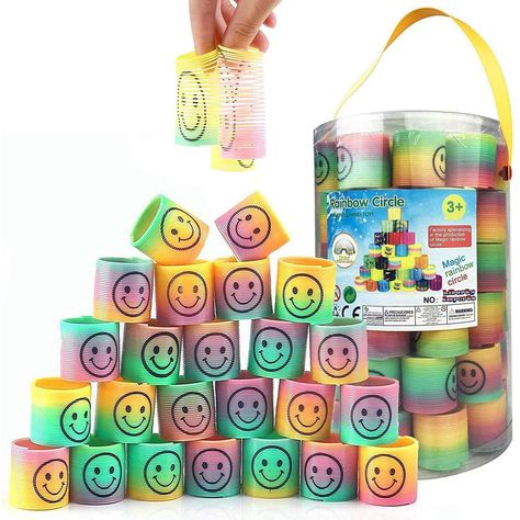 PRICES MAY VARY. VIBRANT COLORS: Elevate your party with assorted rainbow-colored mini springs! These stretchy, magic coil springs are perfect for goodie bag stuffers, adding a pop of color to your celebration. ENDLESS FUN: Make every moment a happy one with our happy face springs. These 72 pieces are versatile party favors, ensuring joyful memories at parties and gathering!w-colored spring coil. Superior quality - will hold up and last! STRESS RELIEF: Experience the magic of these stretchy spri Goodie Bag Stuffers, Goodie Bags For Kids, Rainbow Springs, Student Birthdays, Birthday Goodie Bags, Party Favors For Adults, Carnival Prizes, Rainbow Magic, Art Birthday Party