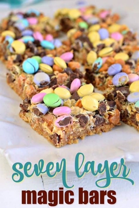 The BEST, Easy Magic Cookie Bars recipe is now at your fingertips. You'll love this 7 layer, chewy treat, that's so versatile for holidays or any day! 7 Layer Magic Cookie Bars, Magic Cookie Bars Recipe, Easter Cookie Bars, Magic Cookie Bar Recipe, Magic Cookie Bars, Layer Bars, Magic Bars, Cookie Brownie Recipe, Shugary Sweets