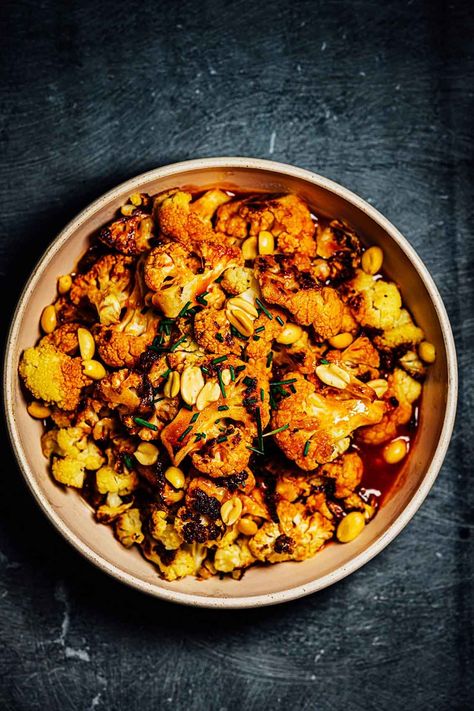 Sweet, spicy, sour, and savory this roasted cauliflower dish gets its punch from the fermented ... Gochujang Cauliflower, Crispy Cauliflower, Cauliflower Dishes, Cauliflower Cheese, Chilli Paste, Vegetarian Entrees, Sweet Chilli, Roasted Cauliflower, Fresh Ginger