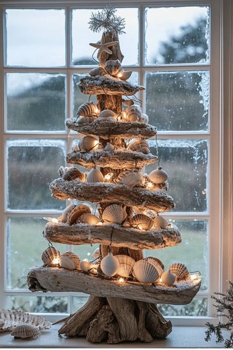 Who says Christmas can't have a beach vibe? Learn how to incorporate coastal elements into your holiday decor for a unique and refreshing take on Christmas. From seashell ornaments to driftwood trees, get inspired! Some of the links in my articles are affiliate links. If you make a qualified purchase from one of my links I will make a small commission at no cost to you. Thank you for your support!!! Seaside Christmas Decor, Shell Trees Coastal Christmas, Coastal Christmas Aesthetic, Costal Christmas Decorations, Ocean Christmas Decor, Diy Coastal Christmas Decor, Diy Coastal Christmas Ornaments, Beach Christmas Crafts, Drift Wood Christmas Tree