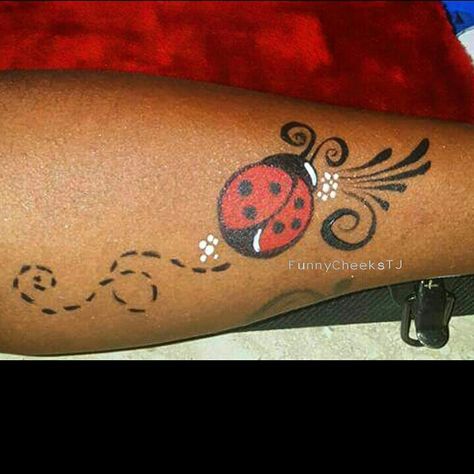 Ladybug arm face painting  by FunnyCheeksTJ of Funny Cheeks Dallas Face Painting. Arm Face Painting, Ladybug Face Paint, Ladybug Painting, Bodysuit Tattoos, Ladybug Tattoo, Cheek Art, Girl Face Painting, Lady Bug Tattoo, Arm Painting