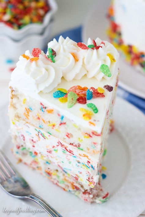 Layer after layer of Fruity Pebble dessert here! This Fruity Pebble Ice Cream Cake is a vanilla Fruity Pebble Cake with a no-churn Fruity Pebble Ice Cream and whipped cream frosting.  PIN IT for later Can you all believe that I am going to be on national TV tonight? Can someone pinch me yet? I … Fruity Pebble Ice Cream, Fruity Pebble Cake, Pebble Ice, Beyond Frosting, Fruity Pebble, Oreo Ice Cream Cake, Tasty Ice Cream, Homemade Ice Cream Cake, Ice Cream Cake Recipe