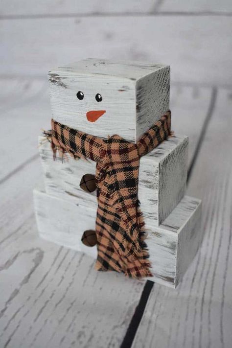 Crafting a snowman from scrap wood blocks is both quick and rewarding. With just a few strokes of paint, you’ll have an adorable winter decoration that adds warmth to your holiday spirit. Scrap 2x4 Projects Diy Christmas, Wood Snowmen Diy, Scrap 2x4 Projects Diy, Scrap 2x4 Projects, Wood Snowman Diy, Wood Block Snowman, Diy Wood Snowman, Wooden Snowman Crafts, Log Snowman