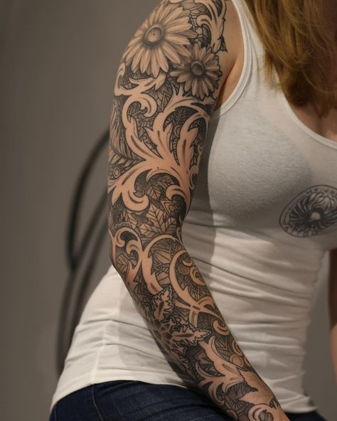 Sleeve tattoos, which cover either your whole arm or very nearly the whole thing, are for people who aren't afraid of commitment. They take time, money, and a Whole Arm Tattoos For Women, Tattoo Ideas Black And White, Tattoo Sleeve Themes, Womens Sleeve Tattoo Ideas, Womens Sleeve Tattoo, Tattoo Ideas Black, Voll Arm-tattoos, Arm Sleeve Tattoos For Women, Cool Half Sleeve Tattoos