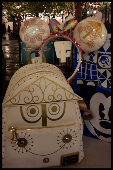 My husband surprised me with this gorgeous "it's a small world" mini backpack and ears!!!  Get the look and #getyourearson  #ad #minibackpack #minnieears #disneyland #disney #disneyparks #waltdisneyworld #collection Small World Disneyland, Its A Small World, It’s A Small World, Loungefly Backpack, It's A Small World, Faux Leather Top, Faux Leather Backpack, Loungefly Bag, Disney Bag