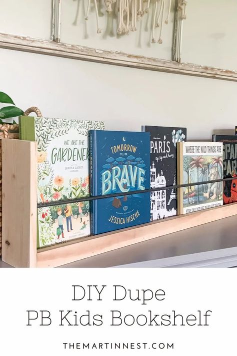 Pottery Barn Kids Inspired DIY Dupe Bookshelf #diyhomedecor #diyprojects #diybookshelf #playroomdecor #kidsroominspo #potterybarnkids #diydupe #pbkidsdupe #homedecorhack Diy Forward Facing Bookshelf, Diy Wall Book Shelf, Diy Kids Bookshelf Wall, Diy Kids Organization Ideas, Diy Easy Bookshelf, Cheap Diy Bookshelves, Diy Wall Bookshelves Kids, Diy Wall Mounted Bookshelves, Diy Nursery Bookshelf