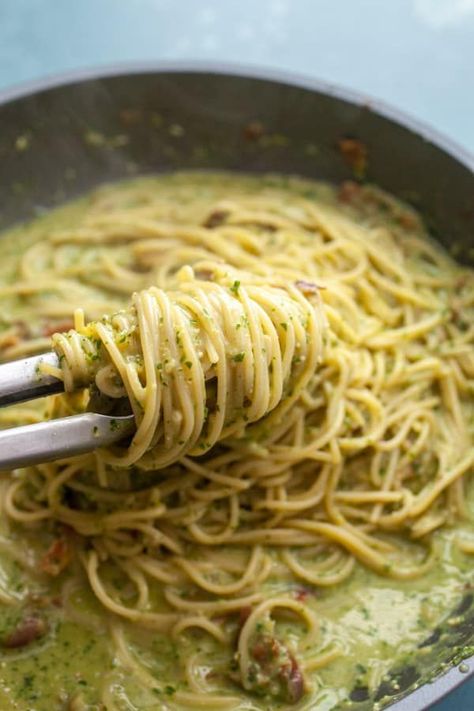 This pasta mashup (made complete with @BarillaUS Spaghetti) has my favorite two pasta sauces mixed together: Fresh pesto and silky smooth carbonara! The trick is to stir the pesto into the carbonara sauce before adding it to the spaghetti. And don’t skimp on the crispy pancetta bits! For #CarbonaraDay take the #CarbonaraChallenge yourself and post your favorite version of the dish on social! Macheesmo.com #carbonara #Italian #spaghetti #pesto #barilla Pesto Carbonara Pasta, Pesto Pancetta Pasta, Carbanora Pasta, Spaghetti Pesto Recipe, Pesto Carbonara, Carbonara With Pancetta, Spaghetti Pesto, Pancetta Recipes, Crispy Pancetta