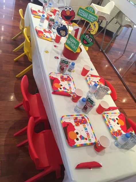 Keenan’ first birthday party | CatchMyParty.com Party Kids Table, Sesame Street Birthday Party Ideas Boy, Sesame Street Birthday Party Ideas, God Daughter, Sesame Street Birthday Party, Sesame Street Party, Sesame Street Birthday, Birthday Party Tables, Kids Table