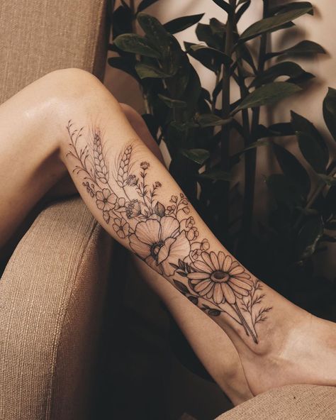 Vlada op Instagram: "Tattoo that I made for Anya, who made all the way from NY to get florals by me 💔 with support of @kiev.tattootrip Thank you so…" Back Of Leg Floral Tattoo, Pretty Floral Tattoos, Wildflower Leg Sleeve Tattoo, Unique Western Tattoos, Wildflower Tattoo Thigh, Flower Calf Tattoo, Wildflower Half Sleeve Tattoo, Rustic Tattoos For Women, Wildflower Tattoo Sleeve