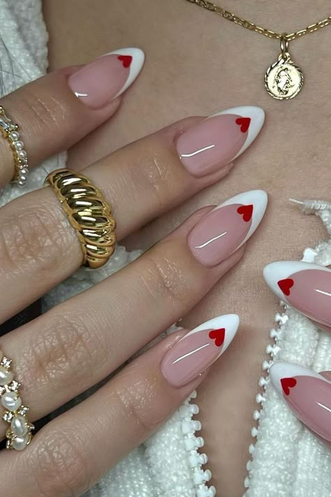 pink nails with white french tips and a small red heart , might take your heart away Paznokcie Hello Kitty, Kutek Disney, Romantic Nails, Nagel Tips, February Nails, Makijaż Smokey Eye, Valentine Nails, Cute Acrylic Nail Designs, Valentines Day Nails