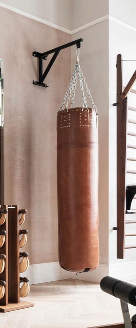 Boxing Area At Home, Hanging Punching Bag Ideas, Punching Bag Home Gym, Home Gym Boxing Bag, Leather Punching Bag, Punching Bag In Apartment, Home Gym With Punching Bag, Hanging Punching Bag, Punching Bag In Bedroom