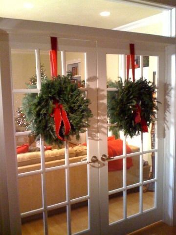 wreaths on french doors | French Doors Fresh Wreaths, Hanging Wreaths, French Holiday, Amazing Christmas Trees, Interior French Doors, Christmas Dining Room, Ribbon On Christmas Tree, By Regina, Hanging Wreath