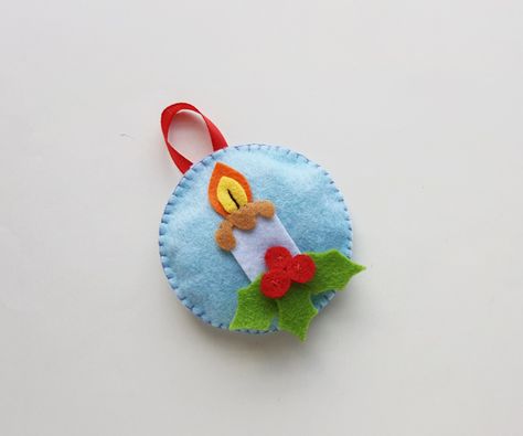 Learn how to make a felt Christmas candle ornament to hang on your tree this holiday season. Felt Candle Wraps, Felt Candle Ornament, Candle Ornament, Hang On, Christmas Candles, Felt Christmas, Christmas Ornament, Holiday Season, Felt